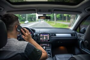 A driver talking on cell phone while driving.