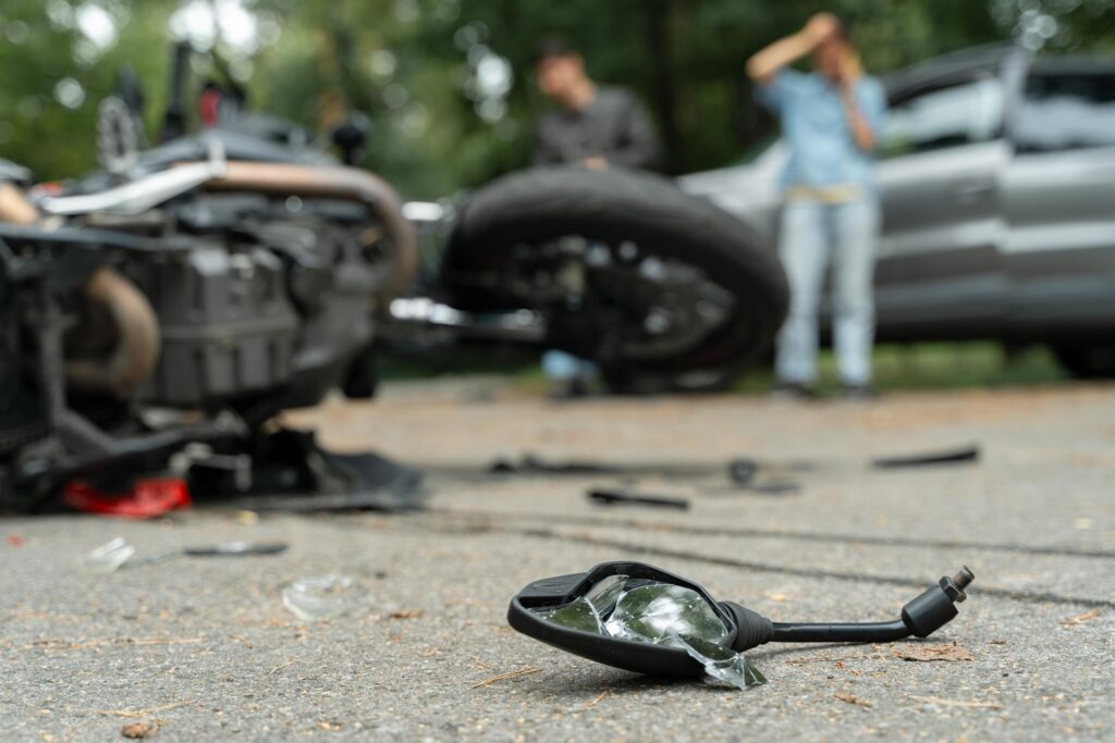 Debris and damaged motorcycle after a fatal collision, representing common deadly motorcycle accidents in Bakersfield, California