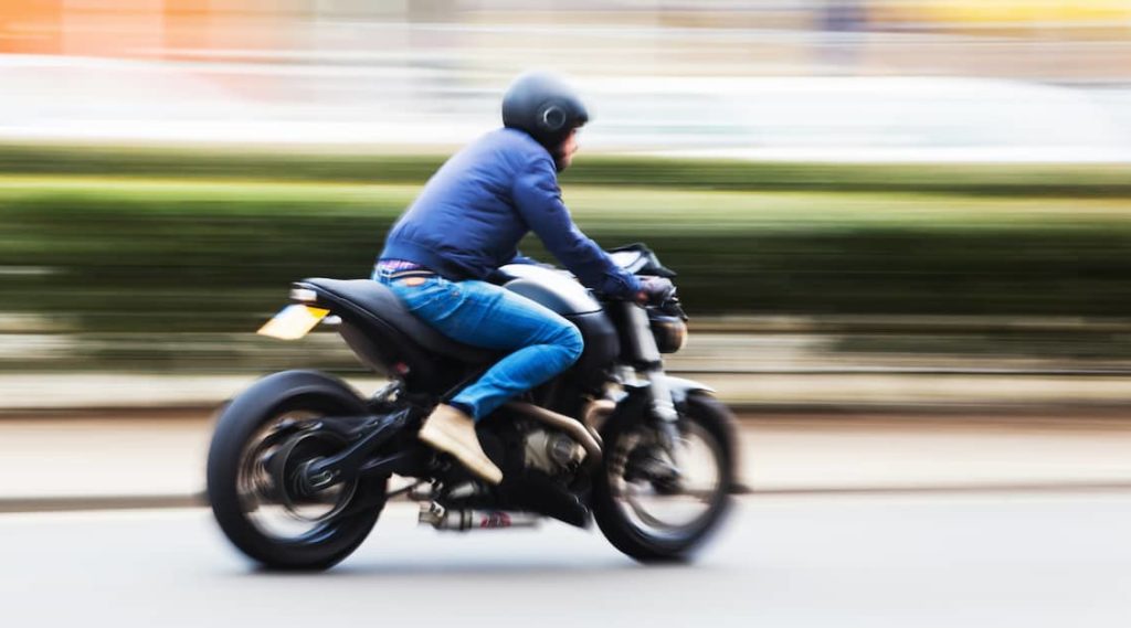 a speeding motorcycle before a crash | The Law Offices of Mickey Fine