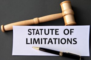 Wooden gavel and black pen placed on a paper with the words Statute of Limitations, symbolizing legal deadlines in personal injury cases