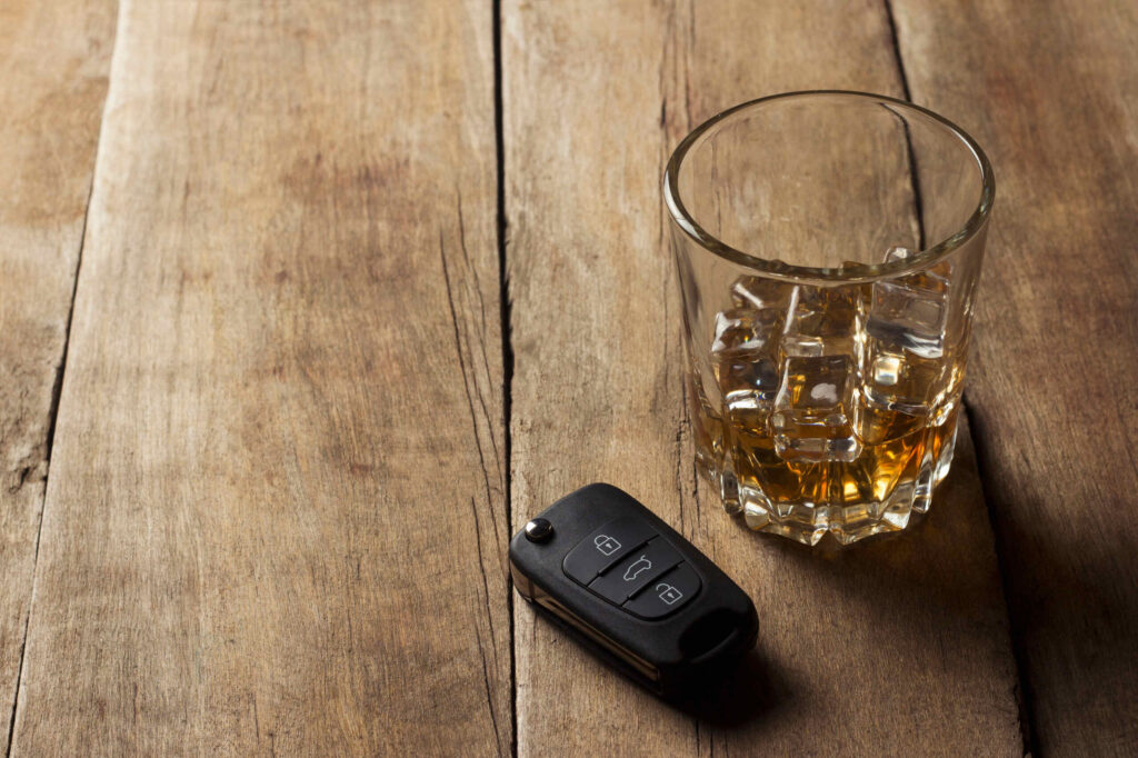 A car key and alcoholic drink in a Bakersfield establishment, illustrating the complexities of dram shop liability in California.