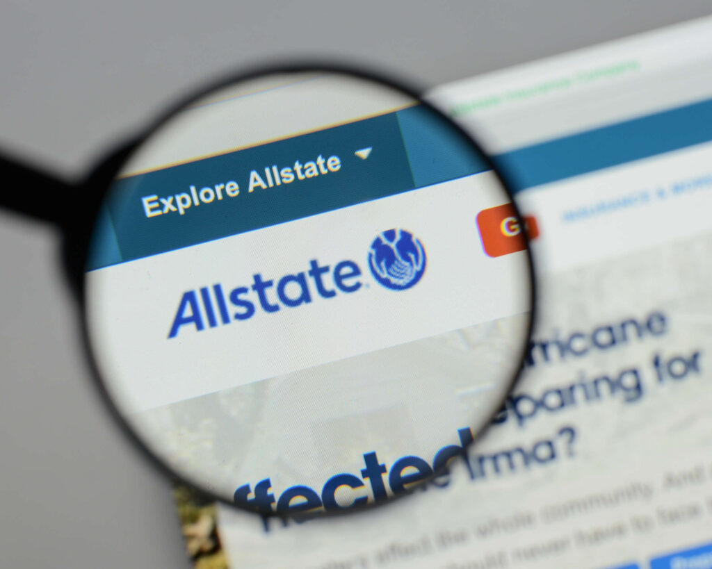 A magnifying glass over the Allstate website logo highlights how much does Allstate pay for bodily injury claims in California.