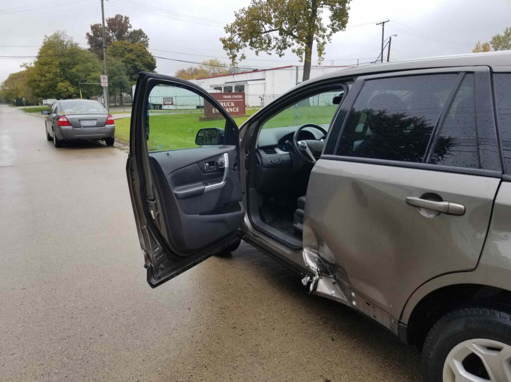 Two silver cars collided at an intersection raising questions about who is liable when you're T-boned while turning left in Bakersfield.